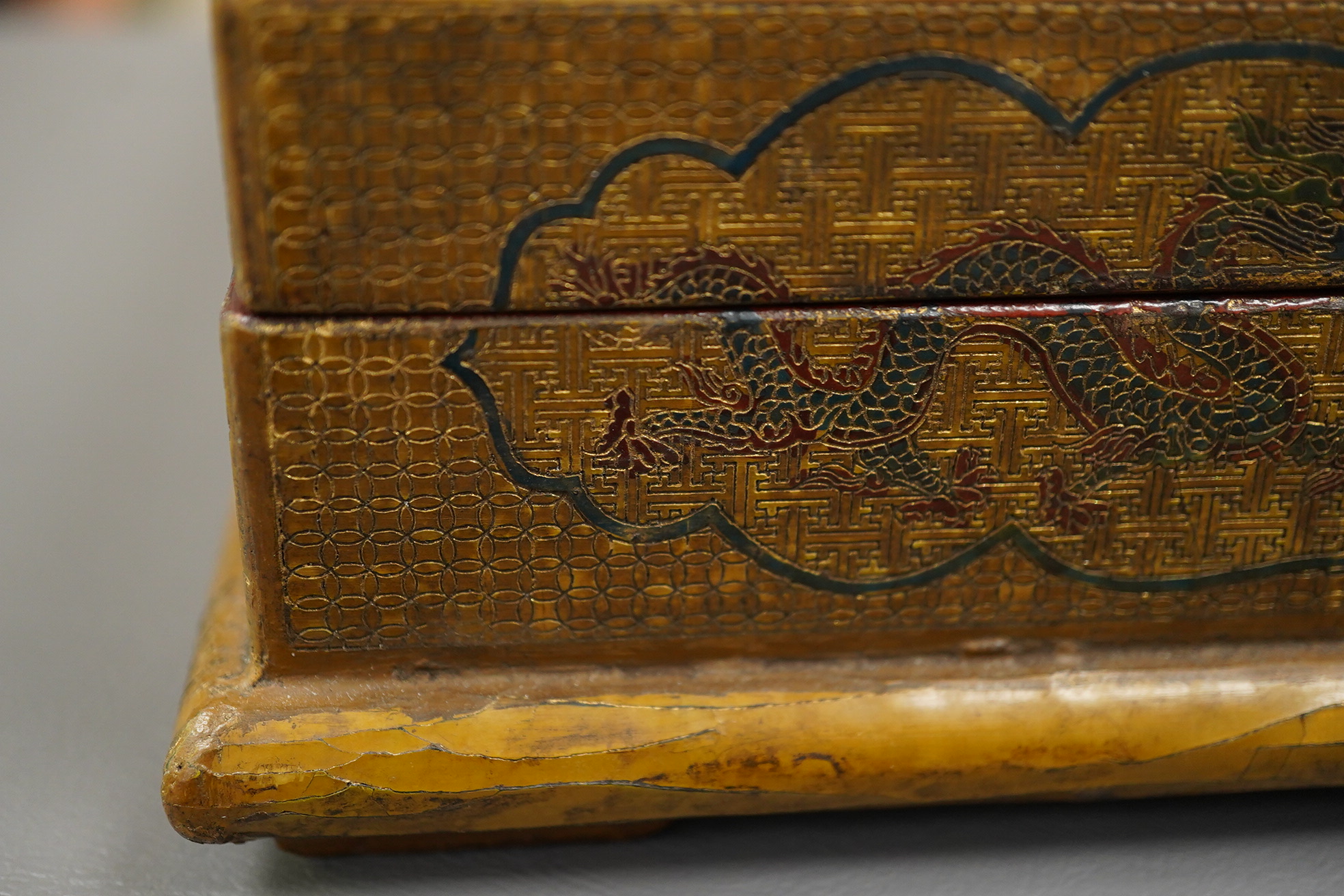 A Chinese inscribed polychrome lacquer document box, Qianlong mark and inscription